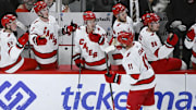 Jan 20, 2025; Chicago, Illinois, USA;  Carolina Hurricanes center Jordan Staal (11) celebrates with teammates  after scoring a goal against the Chicago Blackhawks during the third period at the United Center. Mandatory Credit: Matt Marton-Imagn Images