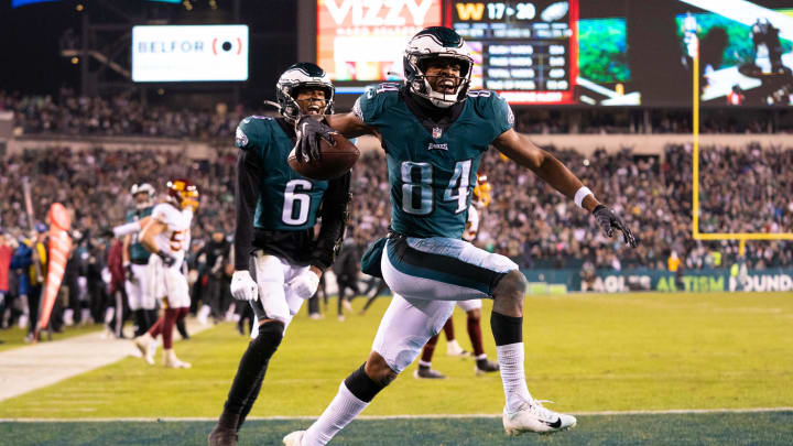 Dec 21, 2021; Philadelphia, Pennsylvania, USA; Philadelphia Eagles wide receiver Greg Ward (84) celebrates in front of wide receiver DeVonta Smith (6) after his touchdown catch against the Washington Football Team during the fourth quarter at Lincoln Financial Field. Mandatory Credit: Bill Streicher-USA TODAY Sports