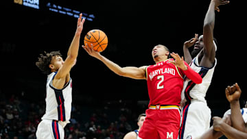 Nov 25, 2025; Las Vegas, NV, USA;Maryland Terrapins guard Myles Rice (2) shoots between Gonzaga Bulldogs guard Jalen Warley (8) and forward Graham Ike (15) in the second half in a 2025 Players Era Festival group play game at MGM Grand Garden Arena. Mandatory Credit: Stephen R. Sylvanie-Imagn Images