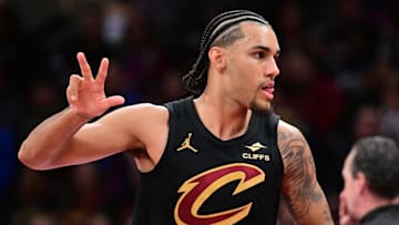 Nov 21, 2025; Cleveland, Ohio, USA; Cleveland Cavaliers guard Jaylon Tyson (20) celebrates after hitting a three point basket against the Indiana Pacers during the second half at Rocket Arena. Mandatory Credit: Ken Blaze-Imagn Images