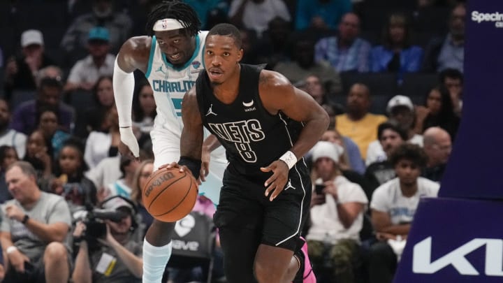 Oct 30, 2023; Charlotte, North Carolina, USA; Brooklyn Nets guard Lonnie Walker IV (8) brings the ball up court against the Charlotte Hornets during the second half at Spectrum Center. Mandatory Credit: Jim Dedmon-USA TODAY Sports