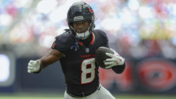 Aug 17, 2024; Houston, Texas, USA; Houston Texans wide receiver John Metchie III (8) runs with the ball after a reception during the game against the New York Giants at NRG Stadium. Mandatory Credit: Troy Taormina-USA TODAY Sports