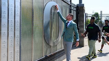 Aug 31, 2024; Eugene, Oregon, USA; Oregon Ducks head coach Dan Lanning touches the O logo before the game against the Idaho Vandals at Autzen Stadium. Mandatory Credit: Craig Strobeck-Imagn Images