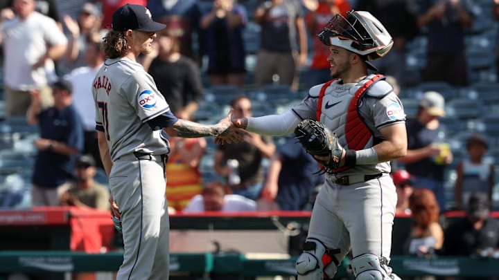 Sep 15, 2024; Anaheim, California, USA;  Houston Astros relief pitcher Josh Hader (71) celebrates a victory with catcher Yainer Diaz (21) after defeating the Los Angeles Angels 6-4 at Angel Stadium.