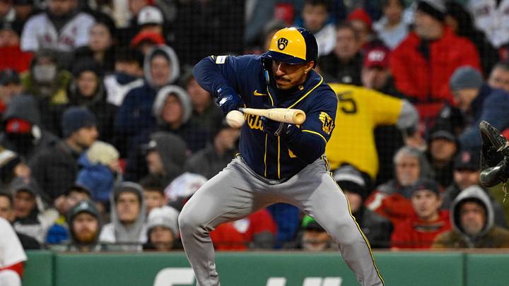 Apr 7, 2026; Boston, Massachusetts, USA; Milwaukee Brewers second baseman David Hamilton (6) bunts against the Boston Red Sox during the third inning at Fenway Park. Mandatory Credit: Eric Canha-Imagn Images