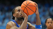 Nov 7, 2025; Chapel Hill, North Carolina, USA;  Kansas Jayhawks guard Darryn Peterson (22) at the free throw line in the first half at Dean E. Smith Center. Mandatory Credit: Bob Donnan-Imagn Images
