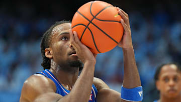Nov 7, 2025; Chapel Hill, North Carolina, USA;  Kansas Jayhawks guard Darryn Peterson (22) at the free throw line in the first half at Dean E. Smith Center. Mandatory Credit: Bob Donnan-Imagn Images