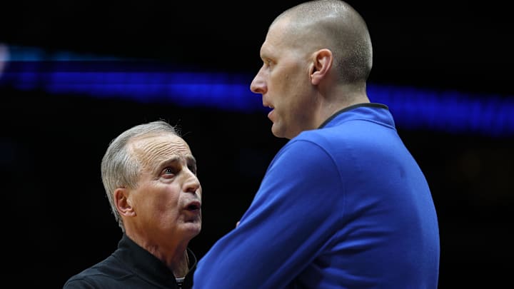 Mar 28, 2025; Indianapolis, IN, USA; Kentucky Wildcats head coach Mark Pope and Tennessee Volunteers head coach Rick Barnes talk after the game for the Midwest Regional semifinal of the 2025 NCAA tournament at Lucas Oil Stadium. Mandatory Credit: Trevor Ruszkowski-Imagn Images