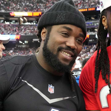 Feb 5, 2023; Paradise, Nevada, USA; NFC running back Dalvin Cook of the Minnesota Vikings (4) and AFC running back Derrick Henry of the Tennessee Titans (22) pose during the Pro Bowl Games at Allegiant Stadium. 