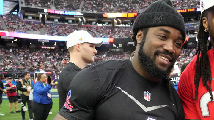 Feb 5, 2023; Paradise, Nevada, USA; NFC running back Dalvin Cook of the Minnesota Vikings (4) and AFC running back Derrick Henry of the Tennessee Titans (22) pose during the Pro Bowl Games at Allegiant Stadium. 