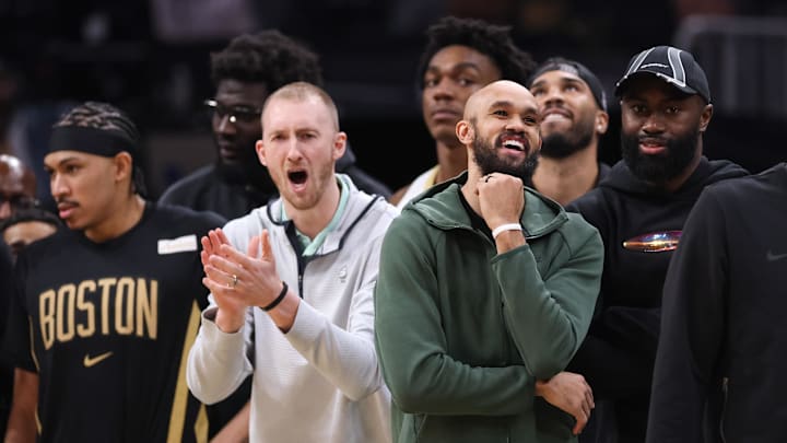 Apr 12, 2026; Boston, Massachusetts, USA; Boston Celtics guard Derrick White (9) reacts during the second half against the Orlando Magic at TD Garden. Mandatory Credit: Paul Rutherford-Imagn Images