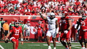 Sep 7, 2024; Salt Lake City, Utah, USA; Baylor Bears defensive lineman Jackie Marshall (0) reacts to a sack on Utah Utes quarterback Isaac Wilson (11) during the third quarter at Rice-Eccles Stadium. Mandatory Credit: Rob Gray-Imagn Images