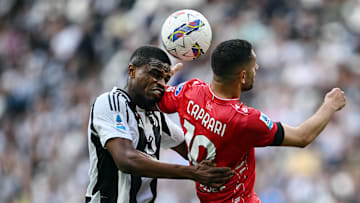 Juve's Pierre Kalulu constantly had to battle with Monza's Gianluca Caprari 