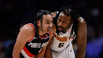 Feb 10, 2025; Denver, Colorado, USA; Portland Trail Blazers guard Dalano Banton (5) and Denver Nuggets center DeAndre Jordan (6) in the fourth quarter at Ball Arena. Mandatory Credit: Isaiah J. Downing-Imagn Images