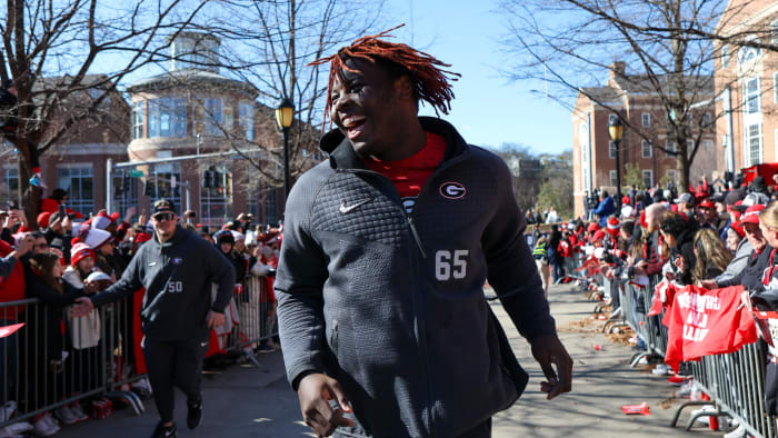 Jan 14, 2023; Athens, GA, USA; Georgia Bulldogs offensive lineman Amarius Mims (65) at the national