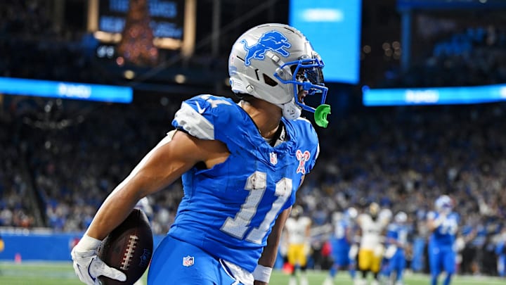 Dec 21, 2025; Detroit, Michigan, USA; Detroit Lions wide receiver Kalif Raymond (11) celebrates after scoring a touchdown during the fourth quarter against the Pittsburgh Steelers at Ford Field. Mandatory Credit: Lon Horwedel-Imagn Images