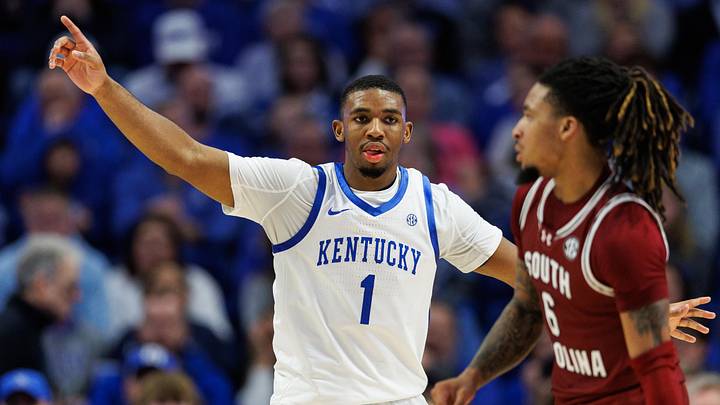 Feb 8, 2025; Lexington, Kentucky, USA; Kentucky Wildcats guard Lamont Butler (1) defends against South Carolina Gamecocks guard Jamarii Thomas (6) during the second half at Rupp Arena at Central Bank Center. Mandatory Credit: Jordan Prather-Imagn Images