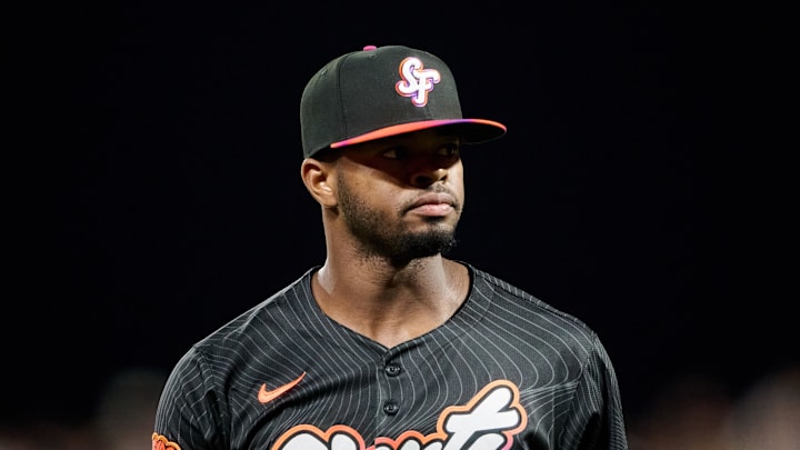 Sep 9, 2025; San Francisco, California, USA; San Francisco Giants pitcher Joel Peguero (63) walks to the dugout against the Arizona Diamondbacks after the last out of the sixth inning at Oracle Park. Mandatory Credit: Robert Edwards-Imagn Images
