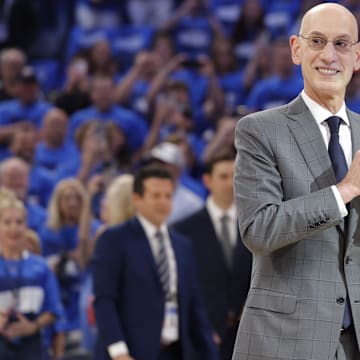 May 22, 2025; Oklahoma City, Oklahoma, USA; NBA commissioner is Adam Silver presents Oklahoma City Thunder guard Shai Gilgeous-Alexander (not pictured) with the Michael Jordan Trophy for winning the most valuable player award for the 2024-25 season before game two of the western conference finals for the 2025 NBA Playoffs at Paycom Center. Mandatory Credit: Alonzo Adams-Imagn Images