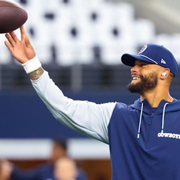 Sep 15, 2024; Arlington, Texas, USA;  Dallas Cowboys quarterback Dak Prescott (4) warms up before the game against the New Orleans Saints at AT&T Stadium. 