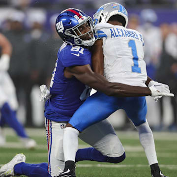 Miles Boykin tackles Lions receiver Maurice Alexander on a punt return. Both players are now on the Bears roster.