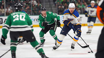 Alex Toropchencko #13 of St. Louis Blues skates up ice while...