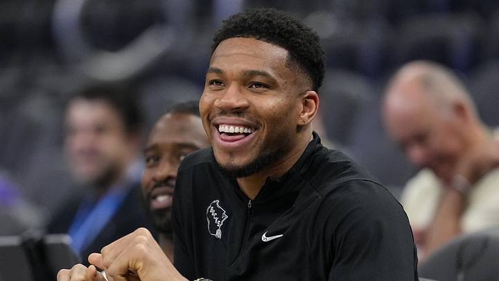Apr 10, 2026; Milwaukee, Wisconsin, USA;  Milwaukee Bucks forward Giannis Antetokounmpo enjoys a moment during warmups prior to the game against the Brooklyn Nets at Fiserv Forum. Mandatory Credit: Jeff Hanisch-Imagn Images