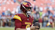 Nov 9, 2025; Landover, Maryland, USA;  Washington Commanders quarterback Marcus Mariota (8) warms up before a game against the Detroit Lions at Northwest Stadium. Mandatory Credit: Geoff Burke-Imagn Images