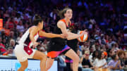 Team WNBA guard Caitlin Clark drives against Team USA guard Kelsey Plum during the WNBA All-Star Game at Footprint Center in Phoenix on July 20, 2024.