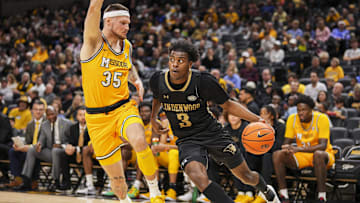 Missouri Tiger forward Jacob Crews (35) defends a player in a game last season.