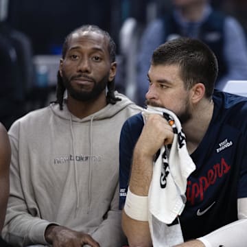 Months after signing him to a one-year contract, the Clippers decided to part ways with Paul (right). 