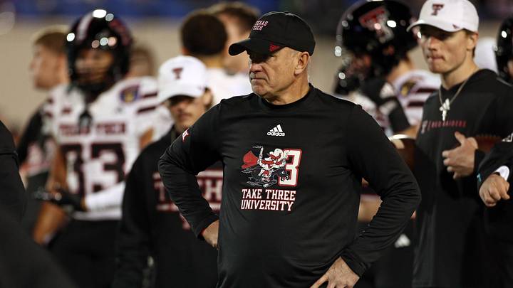 Dec 27, 2024; Memphis, TN, USA; Texas Tech Red Raiders head coach Joey McGuire looks on during warm ups prior to the game against the Arkansas Razorbacks at Simmons Bank Liberty Stadium. Mandatory Credit: Petre Thomas-Imagn Images