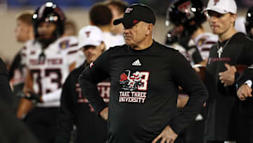 Dec 27, 2024; Memphis, TN, USA; Texas Tech Red Raiders head coach Joey McGuire looks on during warm ups prior to the game against the Arkansas Razorbacks at Simmons Bank Liberty Stadium. Mandatory Credit: Petre Thomas-Imagn Images