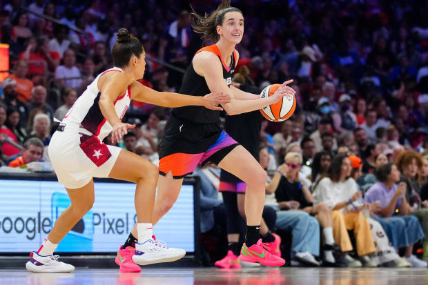 Kelsey Plum plays defense in the WNBA All-Star Game.