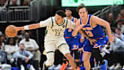 Oct 28, 2025; Milwaukee, Wisconsin, USA;  Milwaukee Bucks guard Ryan Rollins (13) steals the ball from New York Knicks guard Tyler Kolek (13) in the second quarter at Fiserv Forum. Mandatory Credit: Benny Sieu-Imagn Images