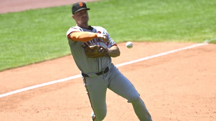 Jul 7, 2024; Cleveland, Ohio, USA; San Francisco Giants third baseman Matt Chapman (26) throws to first base in the sixth inning against the Cleveland Guardians at Progressive Field. Mandatory Credit: David Richard-USA TODAY Sports