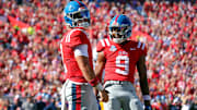 Sep 7, 2024; Oxford, Mississippi, USA; Mississippi Rebels quarterback Jaxson Dart (2) and Mississippi Rebels wide receiver Tre Harris (9) react after a touchdown during the second half against the Middle Tennessee Blue Raiders at Vaught-Hemingway Stadium. Mandatory Credit: Petre Thomas-Imagn Images