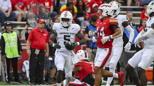 Michigan State Spartans running back Nate Carter (5) reacts after running for a first down during the first quarter against t