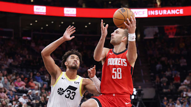 Jack McVeigh (58) goes to the basket against Utah Jazz guard
