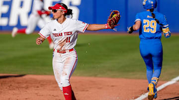 UCLA outfielder Rylee Slimp (29) beats the force-out at first by Texas Tech infielder Lauren Allred (11) in the second inning during a softball game between Texas Tech and UCLA at the Women’s College World Series at Devon Park in Oklahoma City, on Saturday, May 31, 2025.