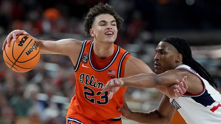 UConn Huskies guard Silas Demary Jr. (2) defends and is called for a foul against Illinois Fighting Illini guard Keaton Wagler (23) on Saturday, April 4, 2026, during a Final Four game at Lucas Oil Stadium in Indianapolis.