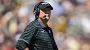 Purdue Boilermakers head coach Barry Odom stands on the sidelines 