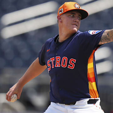 Mar 5, 2025; West Palm Beach, Florida, USA; Houston Astros pitcher Hunter Brown (58) throws a pitch against the St. Louis Cardinals during the first inning at CACTI Park of the Palm Beaches. 