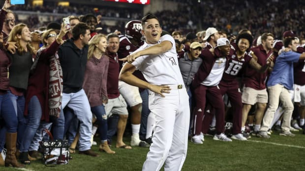 A Texas A&M yell leader does his thing after the Aggies beat LSU 