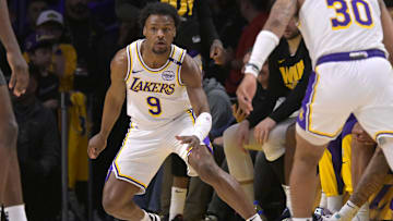 Apr 19, 2025; Los Angeles, California, USA; Los Angeles Lakers guard Bronny James (9) defends on the court in the second half against the Minnesota Timberwolves at Crypto.com Arena. Mandatory Credit: Jayne Kamin-Oncea-Imagn Images
