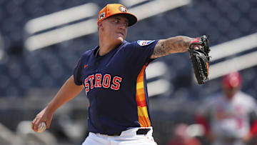 Mar 5, 2025; West Palm Beach, Florida, USA; Houston Astros pitcher Hunter Brown (58) throws a pitch against the St. Louis Cardinals during the first inning at CACTI Park of the Palm Beaches. 