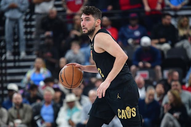 Ty Jerome (2) controls the ball.