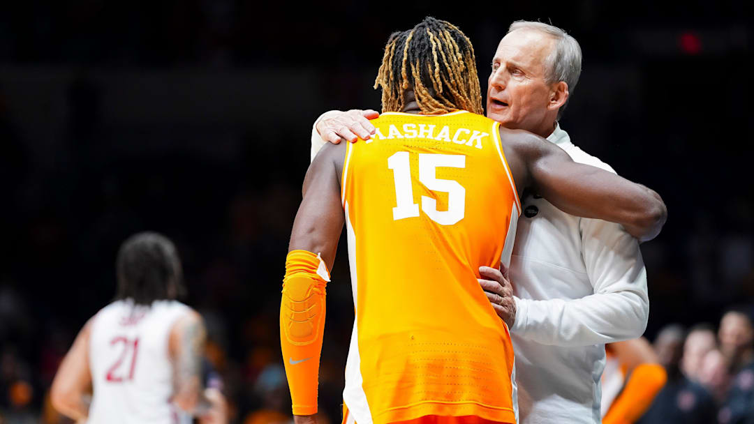 Tennessee head coach Rick Barnes gives Tennessee guard Jahmai Mashack (15) a hug after an NCAA Tournament Elite Eight game between Tennessee and Houston.