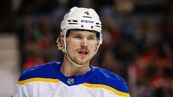Jan 23, 2025; Calgary, Alberta, CAN; Buffalo Sabres defenseman Bowen Byram (4) against the Calgary Flames during the second period at Scotiabank Saddledome. Mandatory Credit: Sergei Belski-Imagn Images