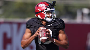 Aug 14, 2025; Fayetteville, AR, USA; Arkansas Razorbacks quarterback Taylen Green (10) drops back to pass during practice. Mandatory Credit: Nelson Chenault-Imagn Images